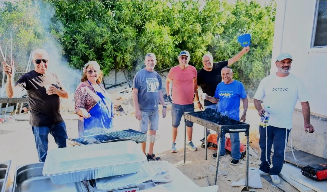Volunteers at the barbecue station