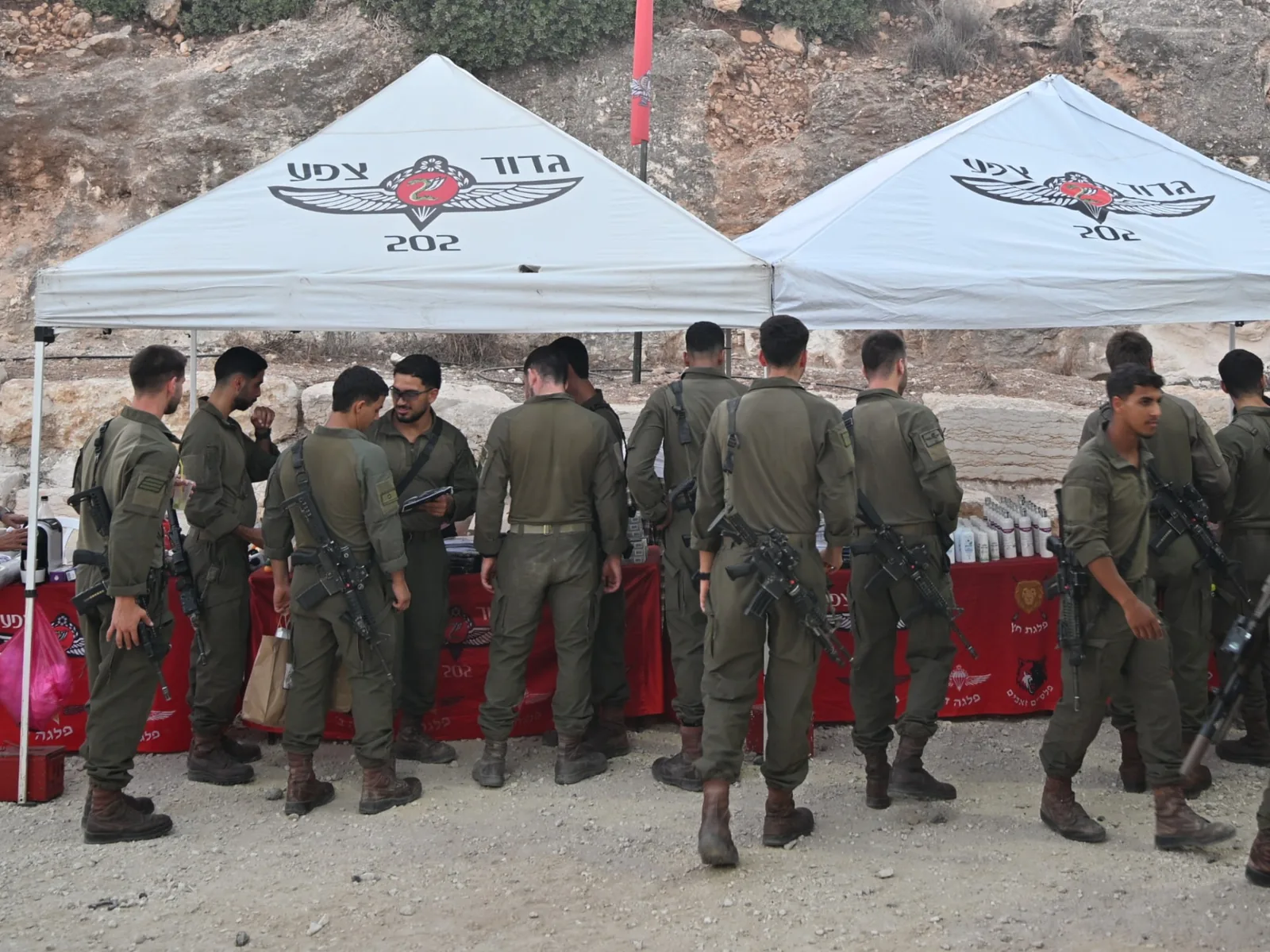 Soldiers gathering at the battalion hospitality tents