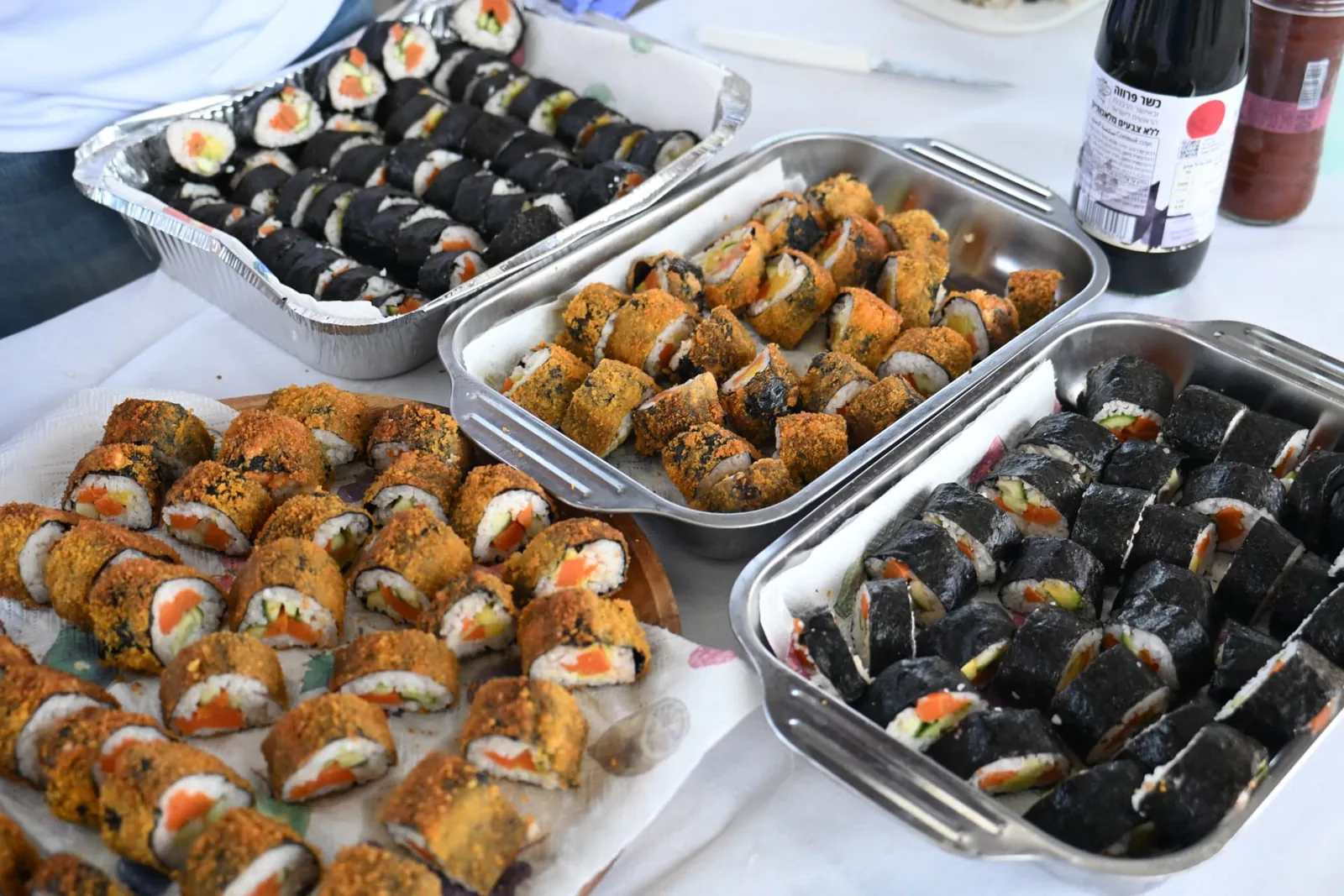 Trays of freshly prepared sushi laid out for the soldiers