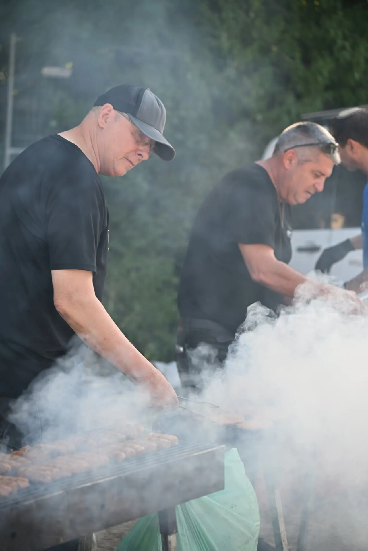 Grilling kebabs over open flames