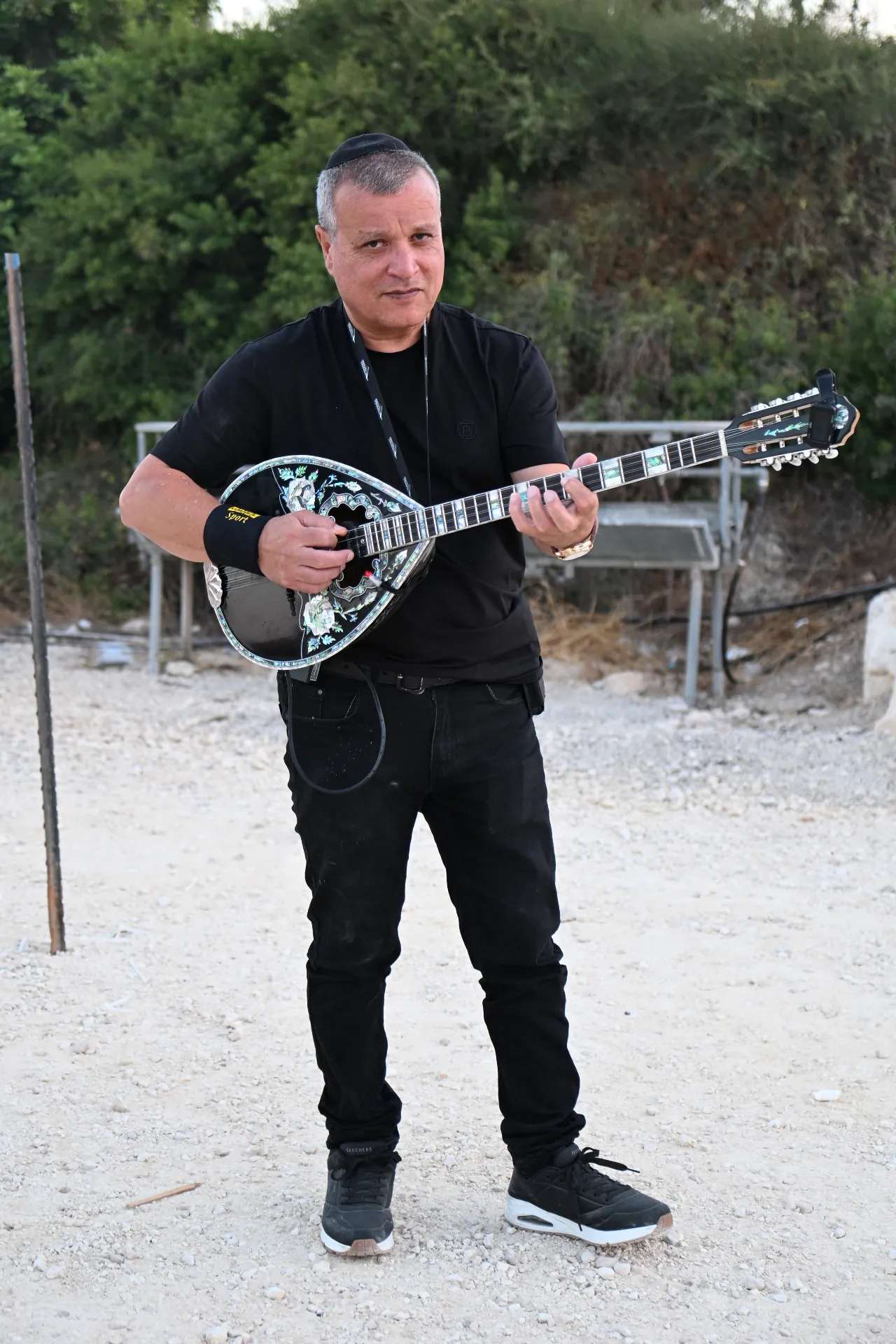Musician performing live during the appreciation evening