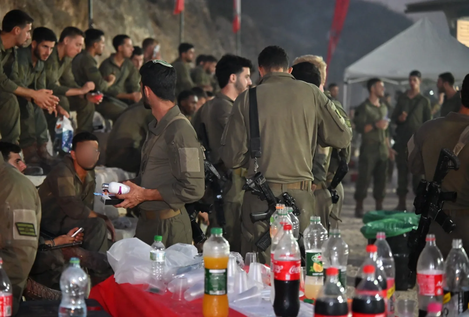 Soldiers receiving gifts and refreshments in the evening