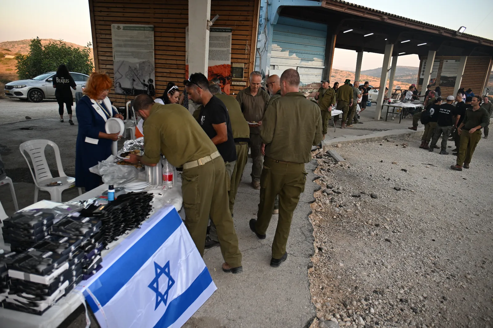 Soldiers being served a warm meal