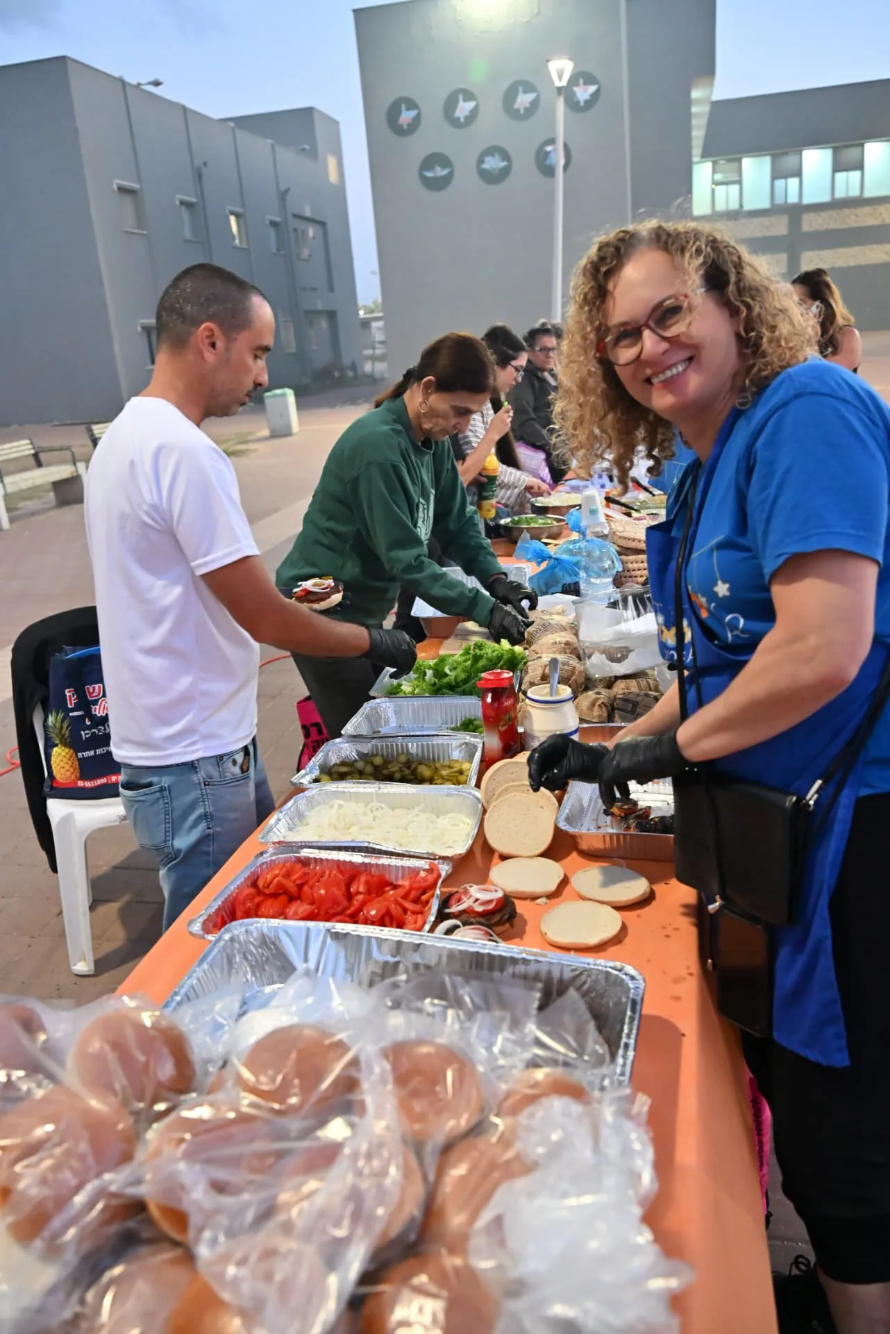 Volunteers serving food at the appreciation evening