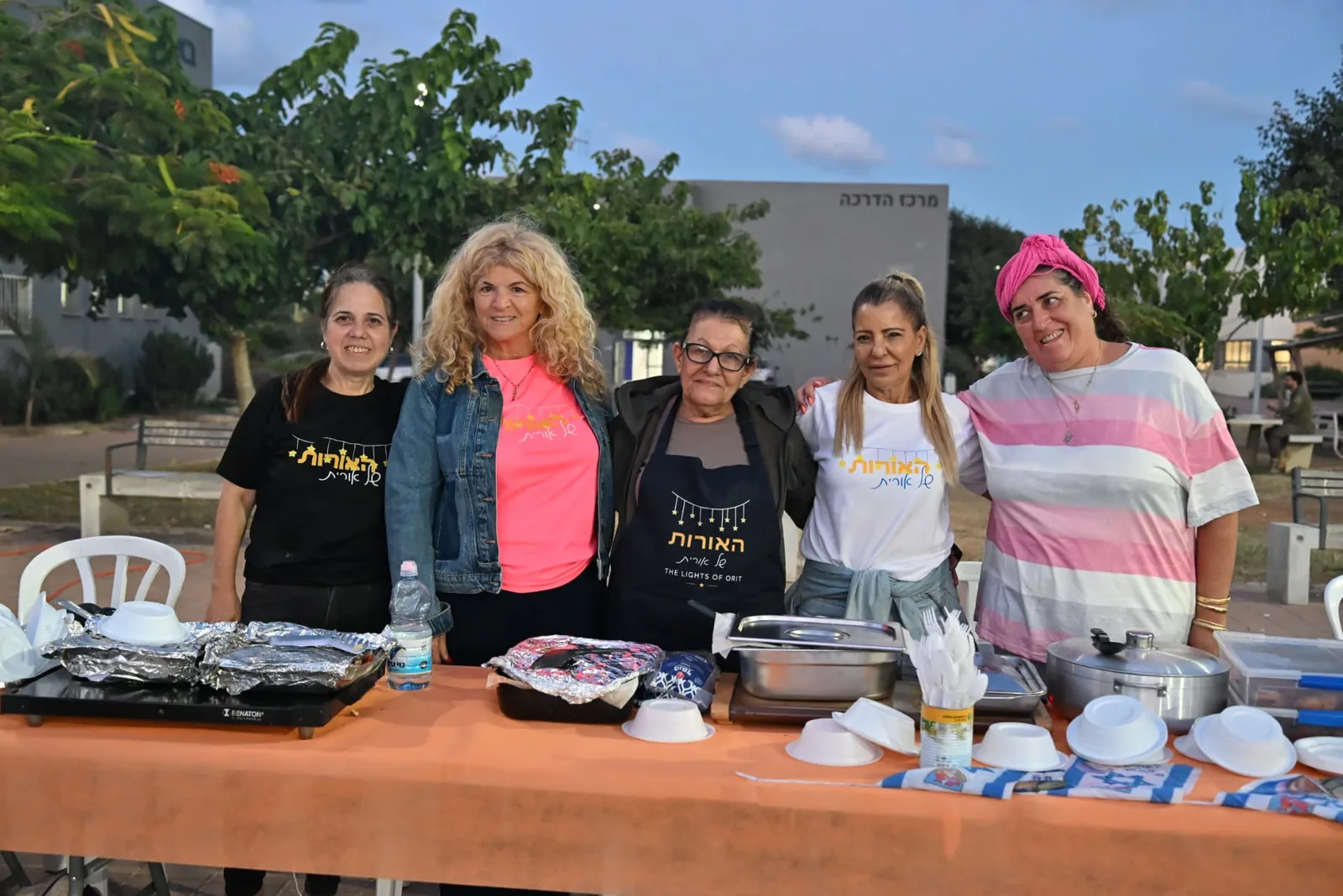 Volunteers behind the serving table
