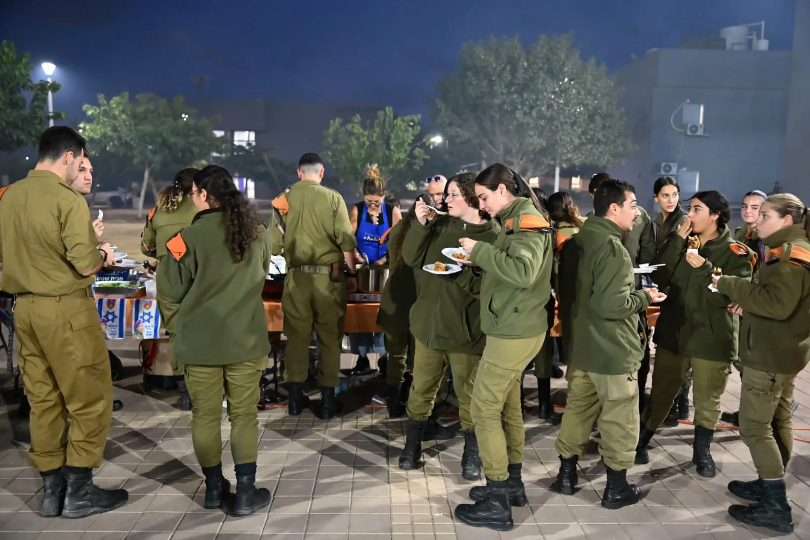 Soldiers gathered around the refreshments table
