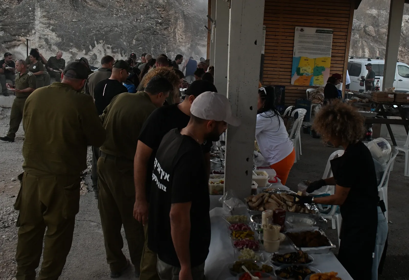 Soldiers gathering at the food spread