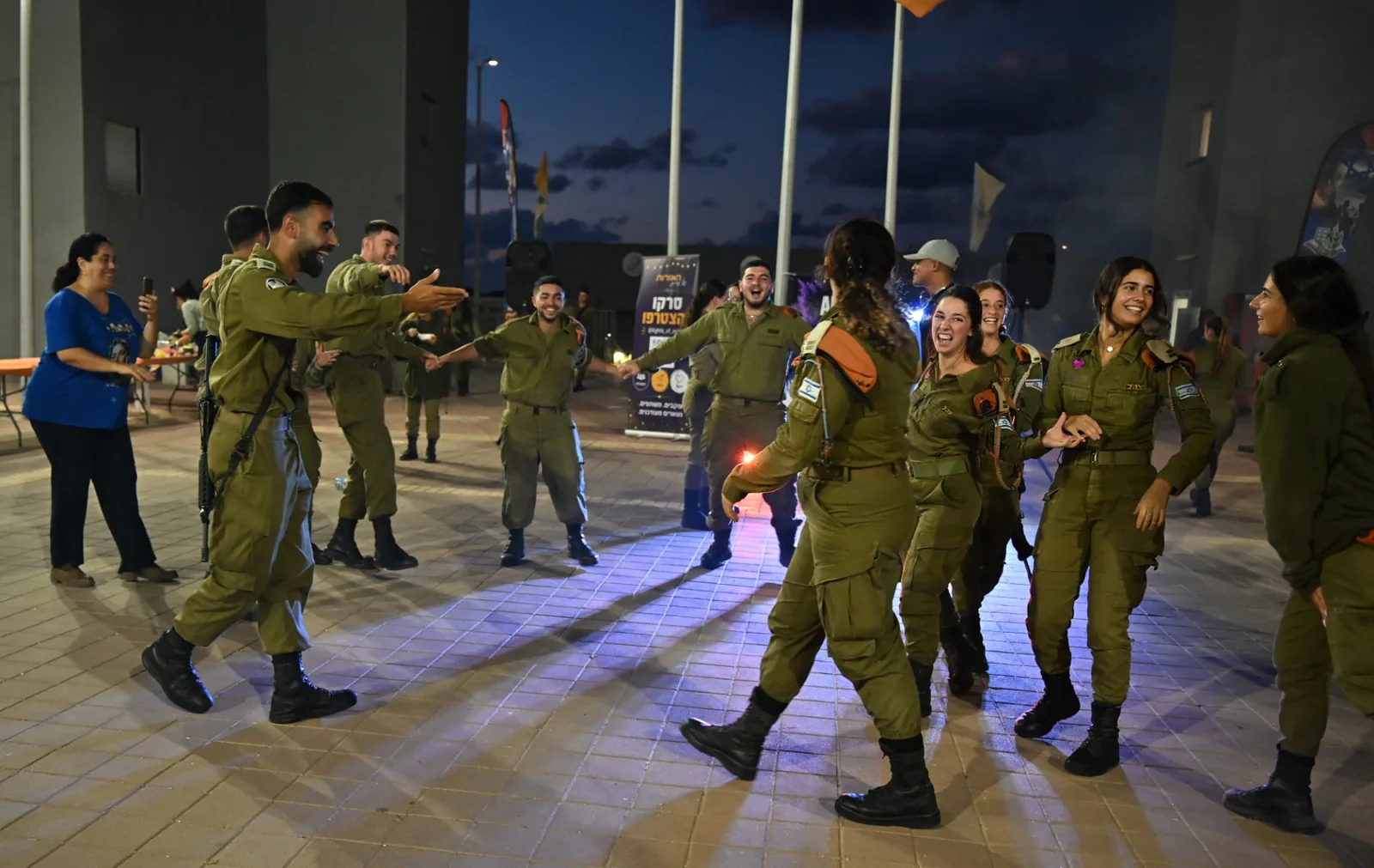 Soldiers dancing together at the appreciation evening