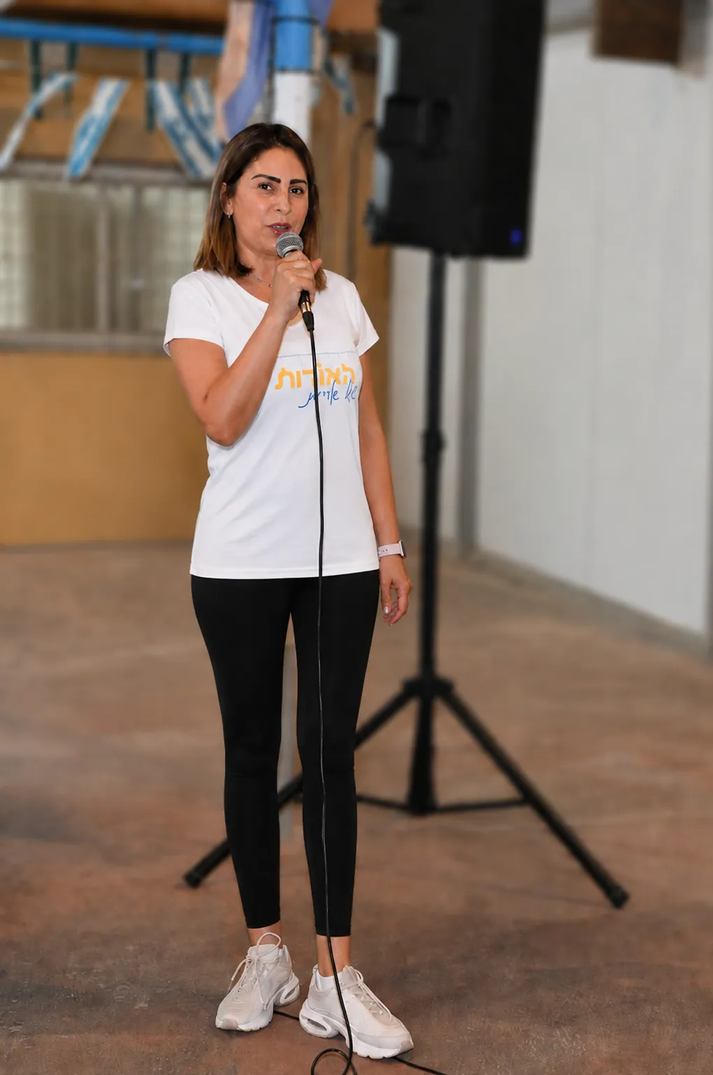 Orit Cohen Peleg speaking at a community event