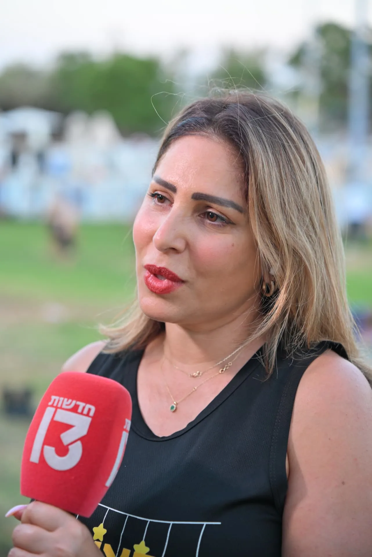Television reporter covering the evening of appreciation