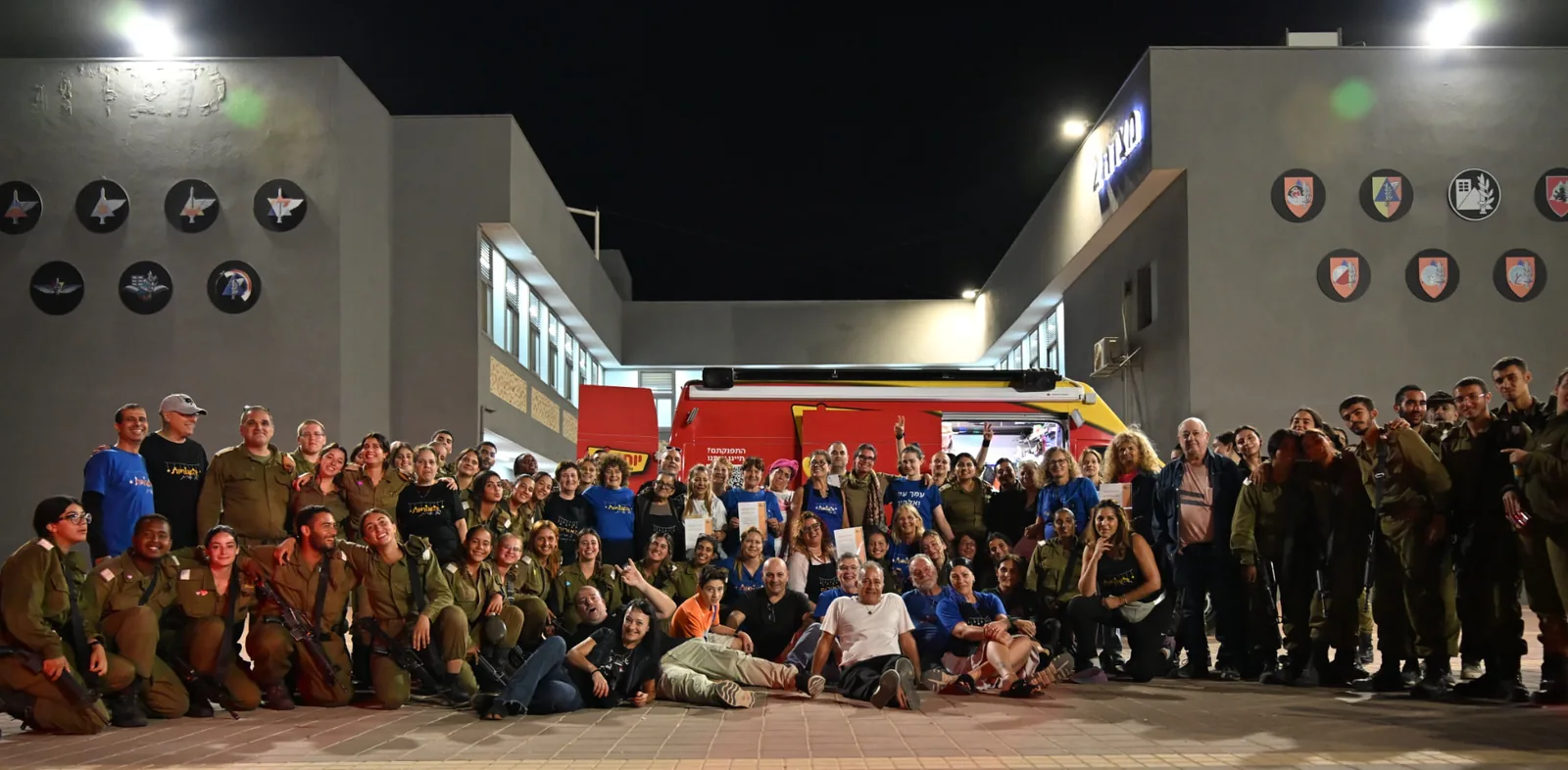 Soldiers and volunteers gathered for a group photo at the appreciation evening