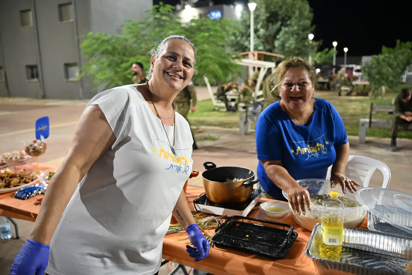Volunteers preparing food in the evening