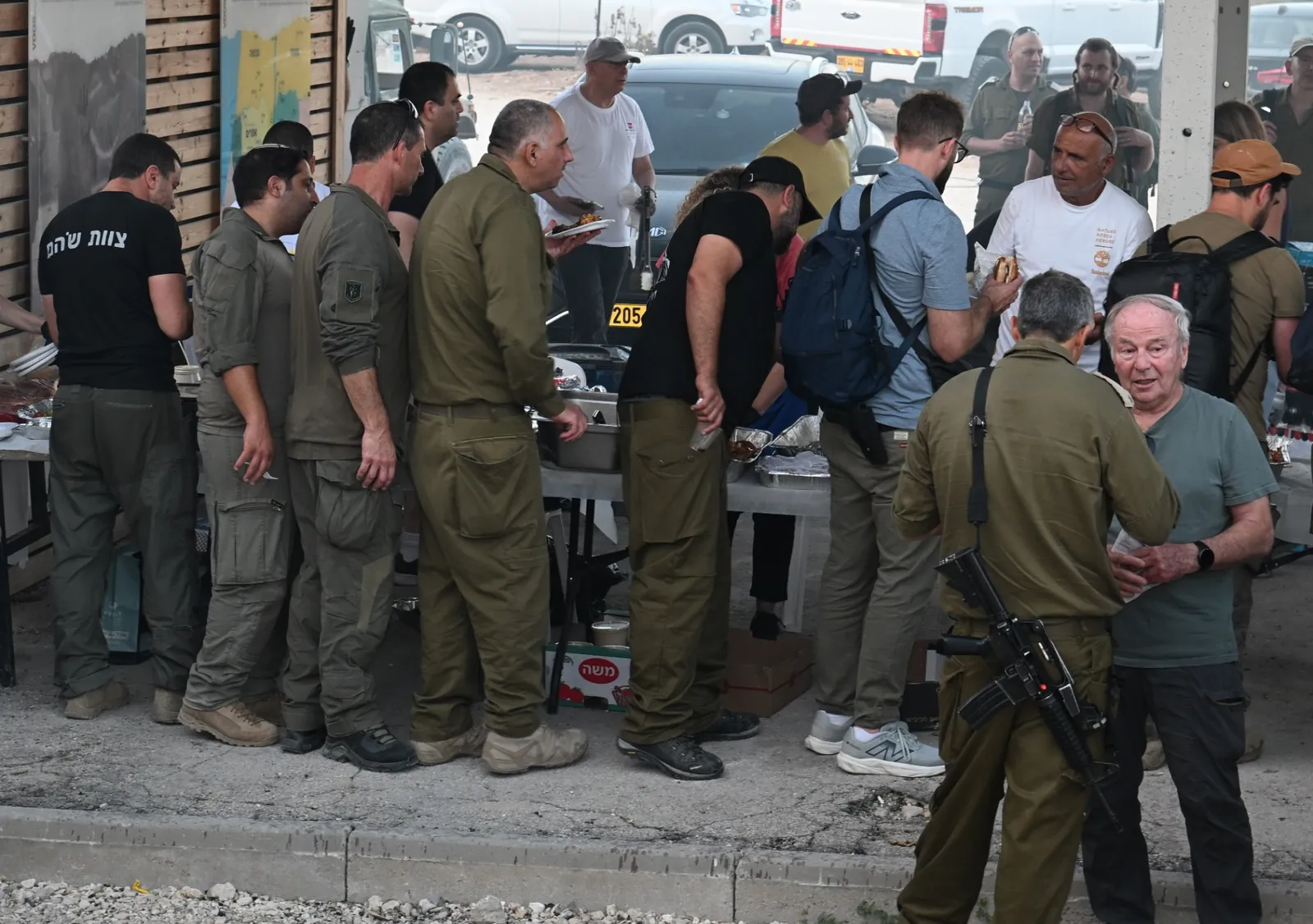Soldiers lining up for the buffet of warm food