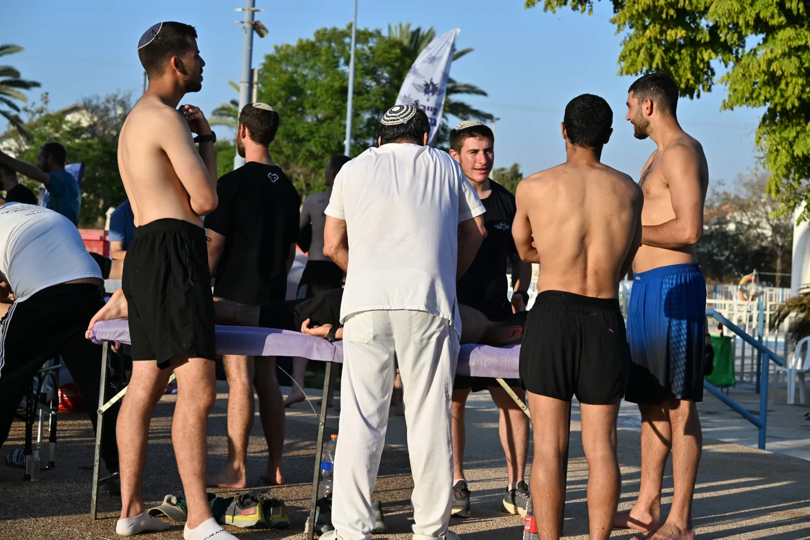 Soldiers gathering by the massage station
