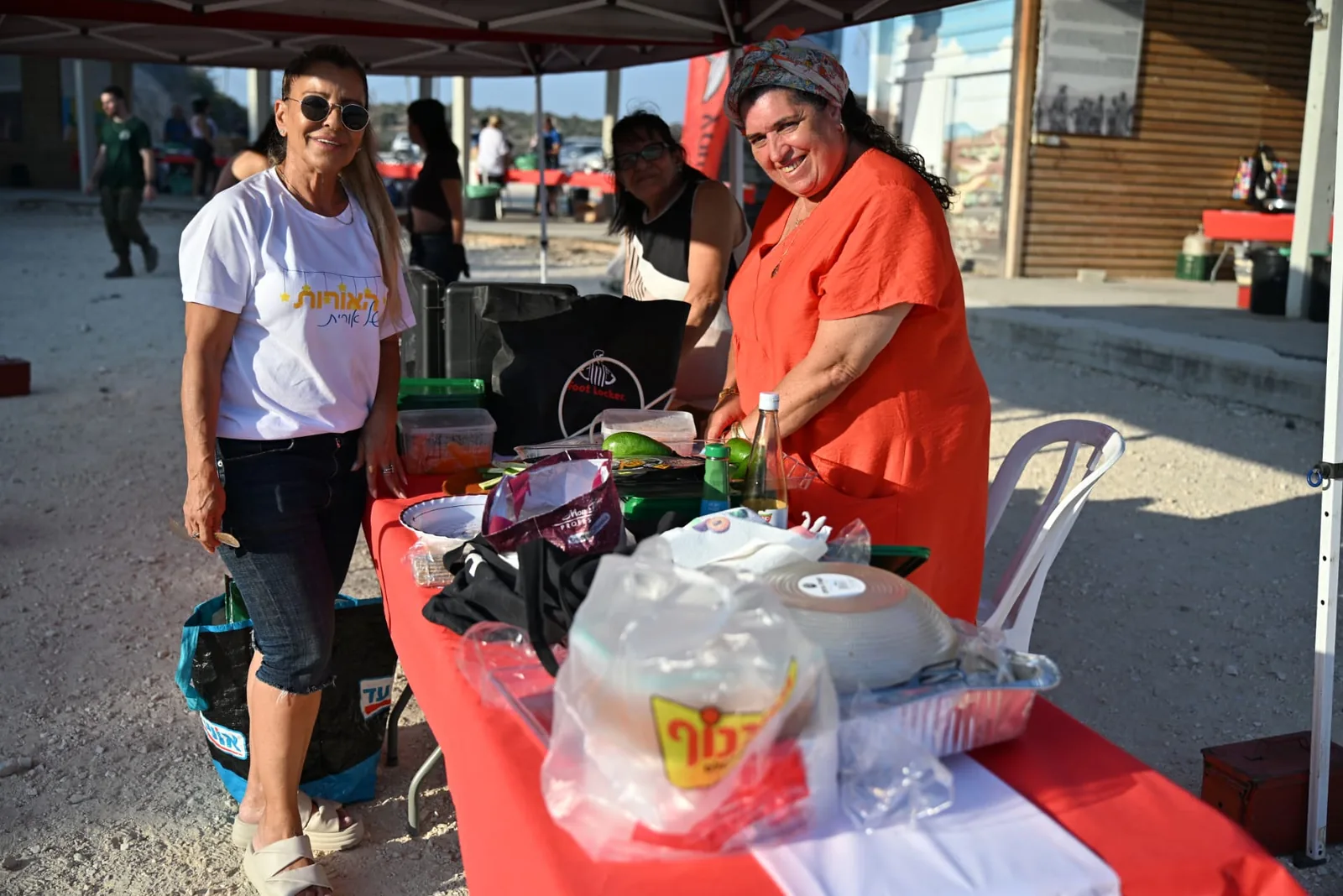 Volunteers setting up the serving tables