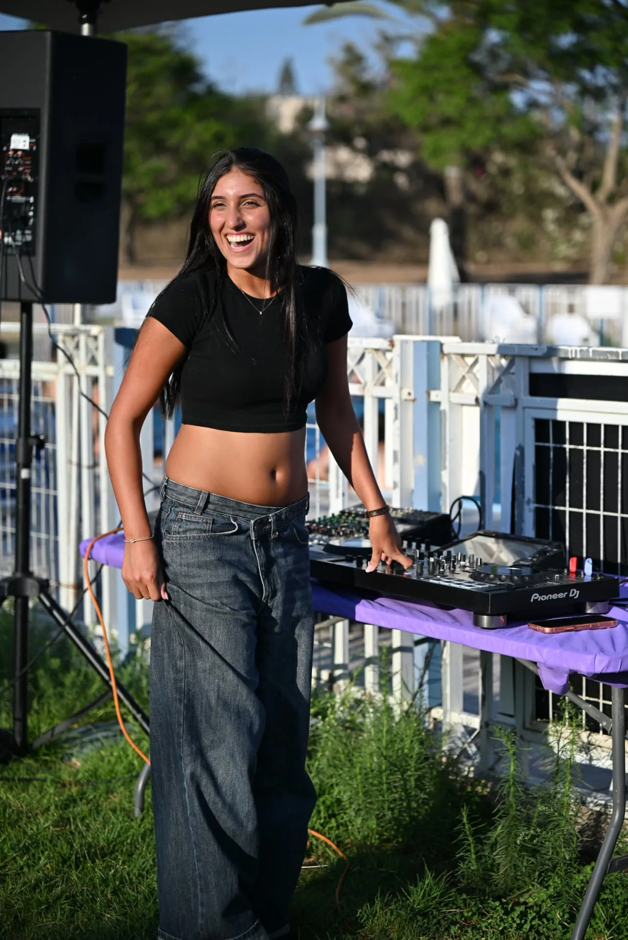 Volunteer DJ bringing music to the evening